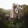 grey concrete castle on green grass field during daytime