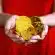 person holding gold-colored ching coins